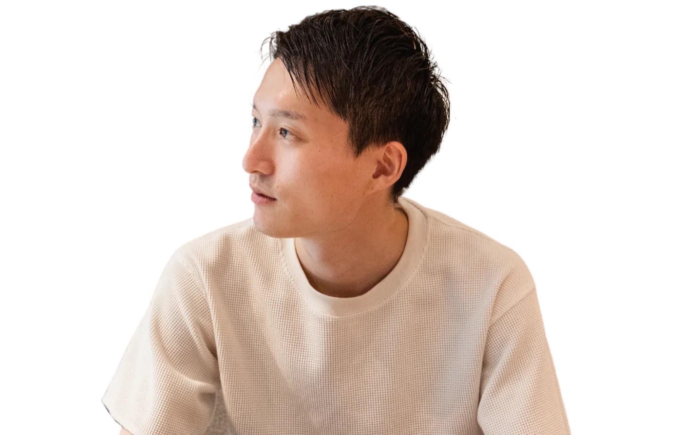 講師の三浦圭人(KEITO)が横を向いて話を聞いている写真